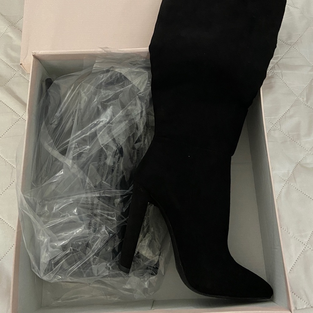 Black velvet heeled boots